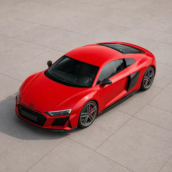 High-Angle View — An elevated viewpoint reveals rooflines, body geometry, and the car's relationship to the surface or setting