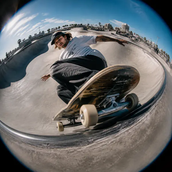 Fisheye Lens — A fisheye lens creates an extremely wide circular or diagonal view with intentionally curved lines and exaggerated spatial distortion