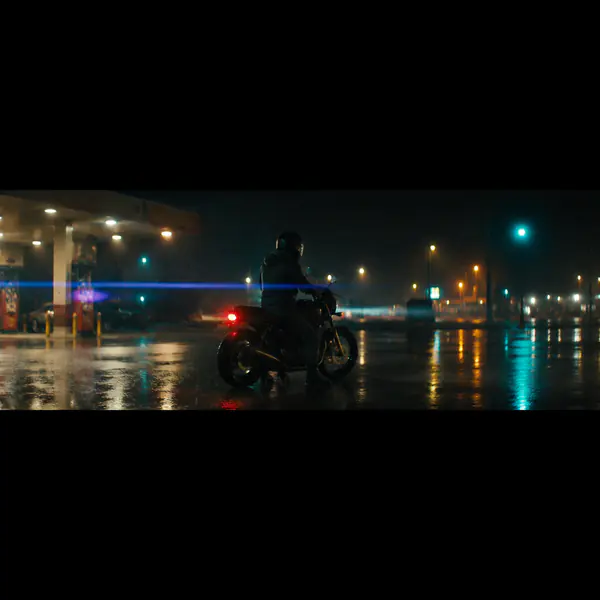 Anamorphic Lens — An anamorphic lens squeezes a wider image onto the sensor, producing cinematic horizontal flare, oval bokeh, and broad framing