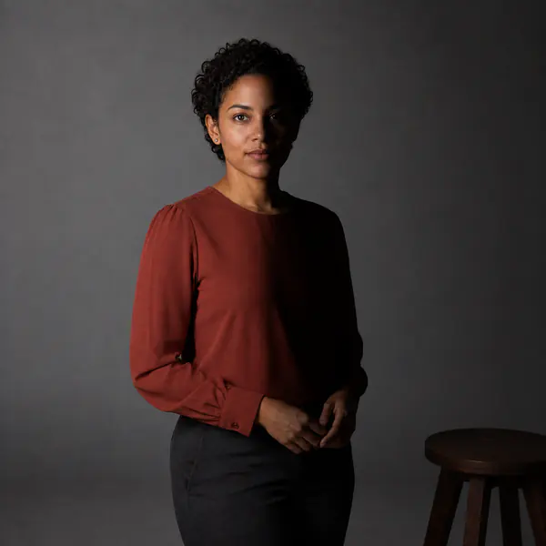 Split Lighting — Side illumination dividing the face into bright and dark halves for drama